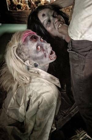Fetish models Brittany Lynn and Jessie Lee giving head in Zombie threesome on tubephoto.pics
