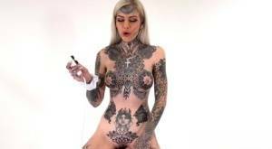 Tattoo enthusiast Amber Luke rides a multispeed sex machine on tubephoto.pics