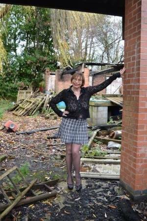 Amateur chick Barby Slut strips to her heels on a demolition site on tubephoto.pics