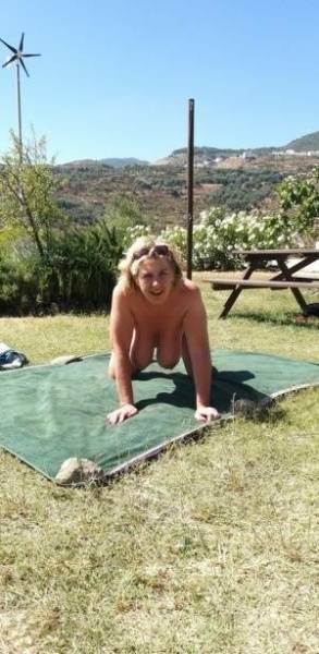 Mature amateur sports a creampie after sex atop a picnic table on tubephoto.pics