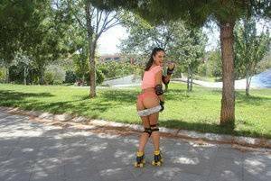 Latina solo girl Carolina Abril shedding shorts to expose nice ass outdoors on tubephoto.pics