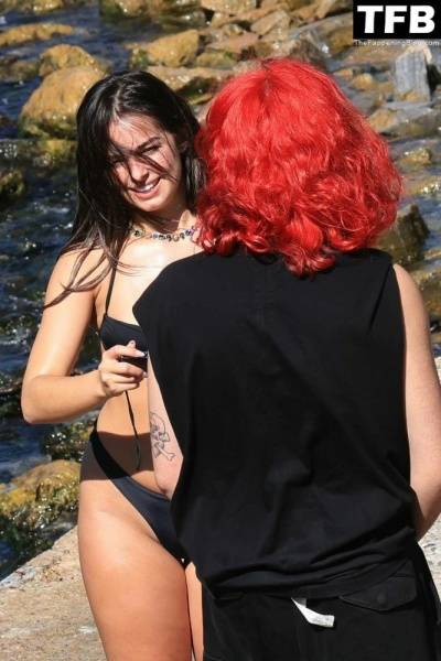 Addison Rae Displays Her Curves in a Black Bikini on Holiday with Omer Fedi on Lake Como on tubephoto.pics