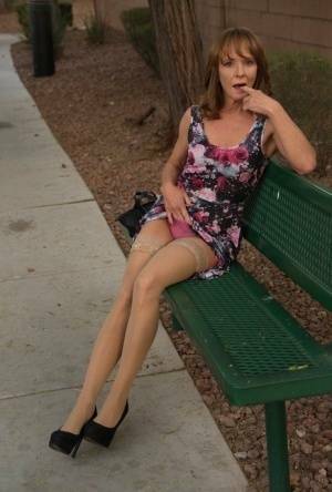 Aged lady flashes her tits and twat on a public bench before disrobing at home on tubephoto.pics