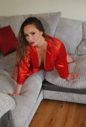 Busty amateur Sophia Delane rubs her cunt on a sofa in a robe and mesh hosiery on tubephoto.pics