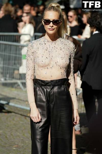 Poppy Delevingne Poses in a See-Through Top at Miu Miu Womenswear Show on tubephoto.pics