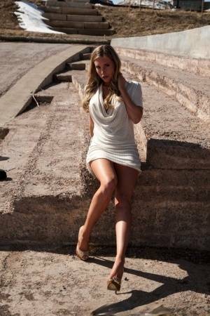 Hot blonde in white dress flashes pierced tits & naked pussy upskirt outdoors on tubephoto.pics