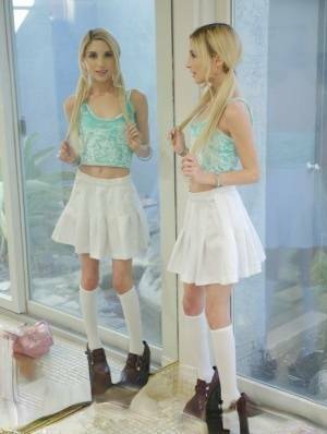 Sweet blonde girl Piper Perri removes her white pretties and skirt on tubephoto.pics