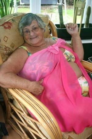 Horny old granny in glasses disrobes to reveal huge saggy tits & big BBW ass on tubephoto.pics
