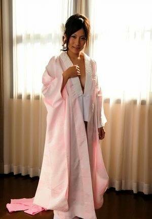 Japanese solo girl slips off her robe to reveal her nice boobs in white socks - Japan on tubephoto.pics