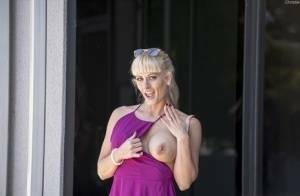Naughty blonde flashes no panty upskirts and her big tits out in public on tubephoto.pics