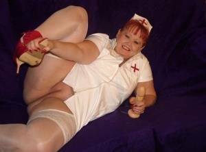 Mature redheaded nurse Valgasmic Exposed exposes herself during dildo play on tubephoto.pics