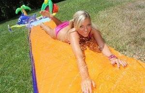 Young blonde Ally Kay ends a water fight by having sex in backyard on tubephoto.pics