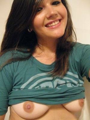 Cutie Veronica takes a slef shot of her nice big tits and firm round ass on tubephoto.pics