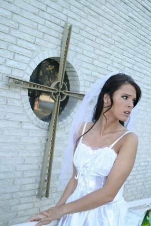 MILF babe in bride's dress Jennifer Dark spreading pussy on tubephoto.pics
